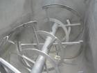 Used J.H. Day Double Spiral Ribbon Blender, 79 cubic root working capacity. 304 stainless steel clad; carbon steel outside.  Non-jacketed trough 40