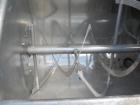 Used J.H. Day Double Spiral Ribbon Blender, 17.8 cubic foot working capacity. 304 stainless steel clad; carbon steel outside.  Non-jacketed trough 24