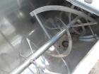 Used J.H. Day Double Spiral Ribbon Blender, 17.8 cubic foot working capacity. 304 stainless steel clad; carbon steel outside.  Non-jacketed trough 24