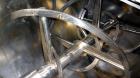 Used J.H. Day Double Spiral Ribbon Blender, 185 cubic feet working capacity, 304 stainless steel. Non-jacketed trough 50
