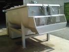 Used Karl Schnell Twin Shaft Ribbon Mixer. All stainless steel, capacity 1190 gallons (4,500 liters). Bowl dimensions 5'3