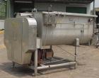 USED: Mepaco model 170 MD twin screw mixer/blender. 5,000 lb or 136 cu ft capacity. Equipped with pneumatically operated end discharge. The mix tub is 64
