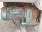USED: Mepaco model 170 MD twin screw mixer/blender. 5,000 lb or 136 cu ft capacity. Equipped with pneumatically operated end discharge. The mix tub is 64
