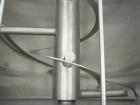 Used Double spiral ribbon blender, 267 cubic feet working capacity, 304 stainless steel. Non-jacketed trough 60