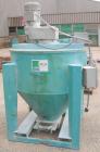 Used Universal Dynamics Vertical Ribbon Mixer, approximately 26 cubic feet, model 65-2000, carbon steel. 48