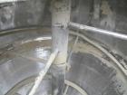 Used Universal Dynamics Vertical Ribbon Mixer, approximately 26 cubic feet, model 65-2000, carbon steel. 48