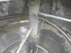 Used- Universal Dynamics Vertical Ribbon Mixer, approximately 26 cubic feet, model 65-2000, carbon steel. 48