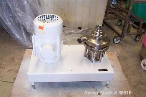 Used Tri Clover Tri-Blender, Model F3218MD-B40, 316 Stainless Steel. Approximate 7.5" diameter impeller. 2-1/2" NPT powder inlet, 4" tri-clamp inlet with hopper, 2" tri-clamp liquid outlet. Dry ingre...