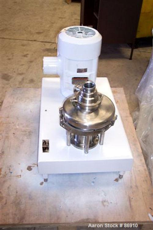 Used Tri Clover Tri-Blender, Model F3218MD-B40, 316 Stainless Steel. Approximate 7.5" diameter impeller. 2-1/2" NPT powder inlet, 4" tri-clamp inlet with hopper, 2" tri-clamp liquid outlet. Dry ingre...