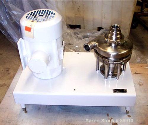 Used Tri Clover Tri-Blender, Model F3218MD-B40, 316 Stainless Steel. Approximate 7.5" diameter impeller. 2-1/2" NPT powder inlet, 4" tri-clamp inlet with hopper, 2" tri-clamp liquid outlet. Dry ingre...