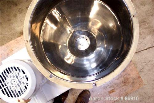 Used Tri Clover Tri-Blender, Model F3218MD-B40, 316 Stainless Steel. Approximate 7.5" diameter impeller. 2-1/2" NPT powder inlet, 4" tri-clamp inlet with hopper, 2" tri-clamp liquid outlet. Dry ingre...