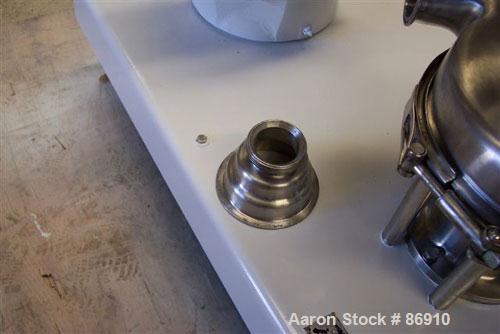 Used Tri Clover Tri-Blender, Model F3218MD-B40, 316 Stainless Steel. Approximate 7.5" diameter impeller. 2-1/2" NPT powder inlet, 4" tri-clamp inlet with hopper, 2" tri-clamp liquid outlet. Dry ingre...