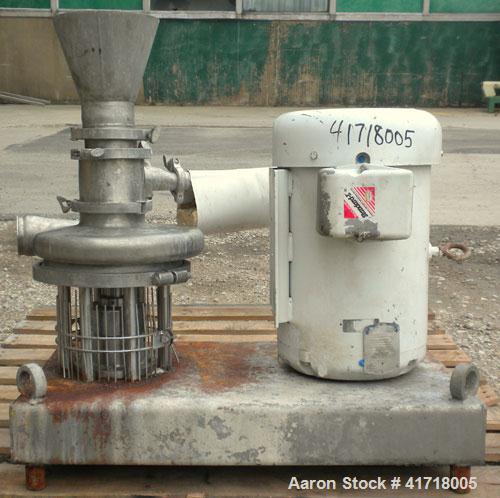 Used Tri-Clover Tri-Blender, Model F4329, 316 stainless steel. Approximate 9 1/2'' diameter impeller, 4" tri-clamp powder inlet with hopper, 1-1/2" tri-clamp liquid inlet, 3" tri-clamp liquid outlet....
