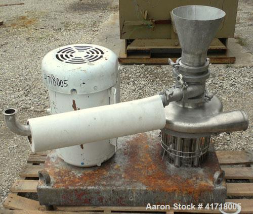 Used Tri-Clover Tri-Blender, Model F4329, 316 stainless steel. Approximate 9 1/2'' diameter impeller, 4" tri-clamp powder inlet with hopper, 1-1/2" tri-clamp liquid inlet, 3" tri-clamp liquid outlet....