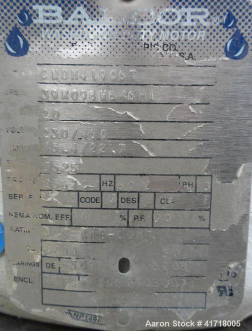 Used Tri-Clover Tri-Blender, Model F4329, 316 stainless steel. Approximate 9 1/2'' diameter impeller, 4" tri-clamp powder inlet with hopper, 1-1/2" tri-clamp liquid inlet, 3" tri-clamp liquid outlet....