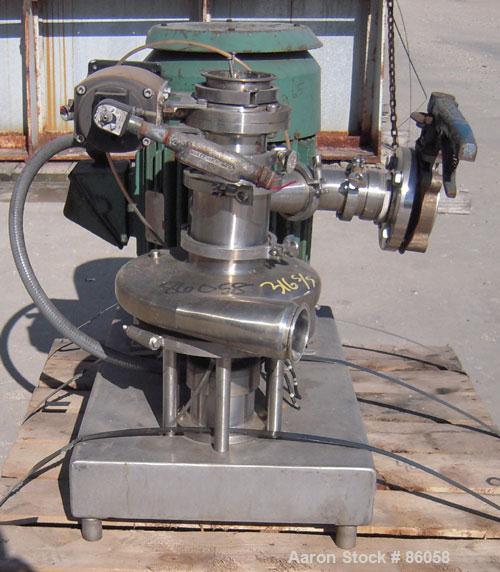 Used Tri-Clover Tri-Blender, Model F4329, 316 Stainless Steel. Approximate 9 1/2" diameter impeller, 4" tri-clamp powder inlet, no hopper, 2" tri-clamp liquid inlet, 3" tri-clamp liquid outlet. Dry i...