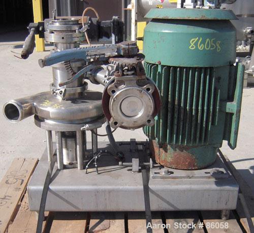 Used Tri-Clover Tri-Blender, Model F4329, 316 Stainless Steel. Approximate 9 1/2" diameter impeller, 4" tri-clamp powder inlet, no hopper, 2" tri-clamp liquid inlet, 3" tri-clamp liquid outlet. Dry i...