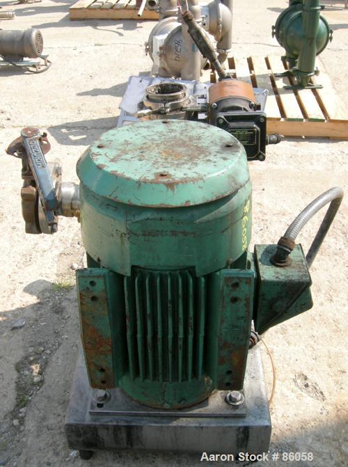 Used Tri-Clover Tri-Blender, Model F4329, 316 Stainless Steel. Approximate 9 1/2" diameter impeller, 4" tri-clamp powder inlet, no hopper, 2" tri-clamp liquid inlet, 3" tri-clamp liquid outlet. Dry i...