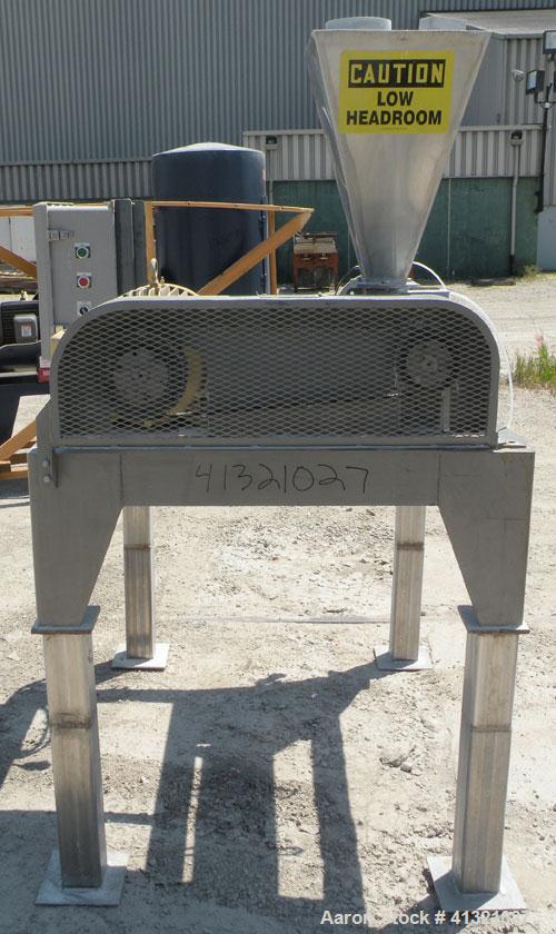Used Hosokawa Micron Turbulizer, Model TCX-8, 304 stainless steel. 8" diameter x 28" long non-jacketed clamshell design chamber. Approximately 3" diameter shaft with 4 rows of (14) screw in blades. 4...