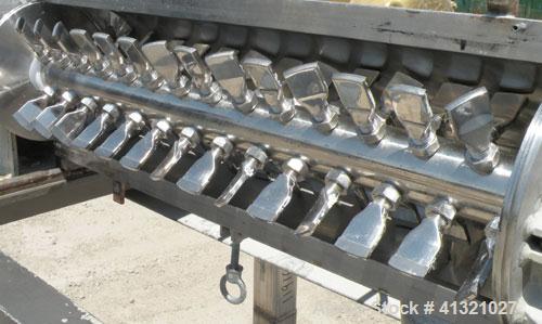 Used Hosokawa Micron Turbulizer, Model TCX-8, 304 stainless steel. 8" diameter x 28" long non-jacketed clamshell design chamber. Approximately 3" diameter shaft with 4 rows of (14) screw in blades. 4...