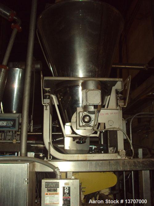 Used Munson Mixer, Model HIM-83/124 SS. Mixing chamber 4' long x 12" deep, 20 hp main drive, feeder 33" long x 9" deep, 10 hp, mixing liquids and solids. Includes (2) Schenck Accu Rate feeders, (1) l...