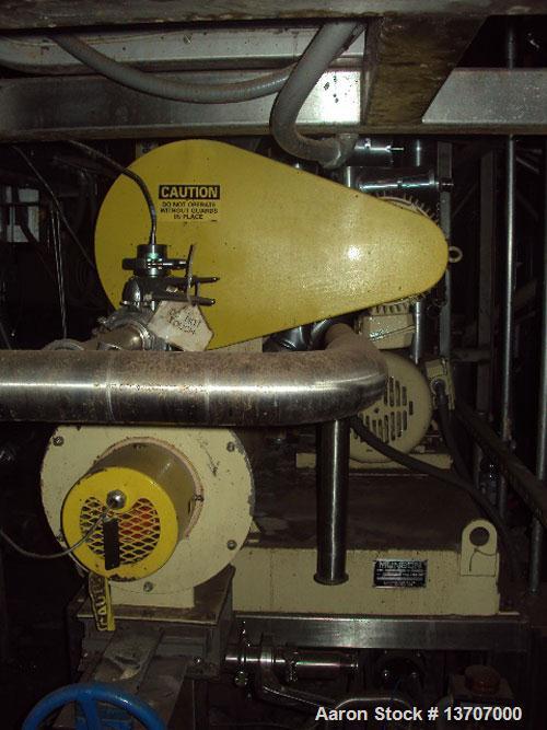 Used Munson Mixer, Model HIM-83/124 SS. Mixing chamber 4' long x 12" deep, 20 hp main drive, feeder 33" long x 9" deep, 10 hp, mixing liquids and solids. Includes (2) Schenck Accu Rate feeders, (1) l...