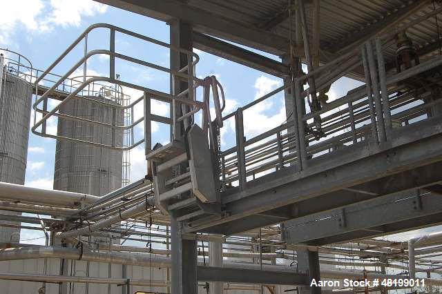 Used Tanker Truck Safety Loading Station. (4) Truck bays. Approximate 40' x 80' with roof.