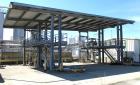 Used Tanker Truck Safety Loading Station. (4) Truck bays. Approximate 40' x 80' with roof.