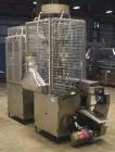 Used Pamasol 4 Head Valve Crimper Coupled to Pamasol P 2002 4 Head Gasser