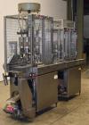 Used Pamasol 4 Head Valve Crimper Coupled to Pamasol P 2002 4 Head Gasser