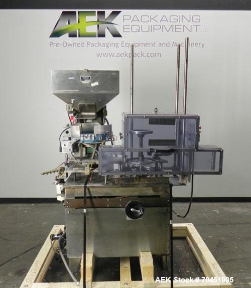 Used Haumiller Stainless Steel (6) Pocket Spray Tip Applicator. Single Hammer, 16” vibratory feeder bowl. Approximate 24” x 24” x 12” deep hopper. Allen Bradley Panel View 1000.