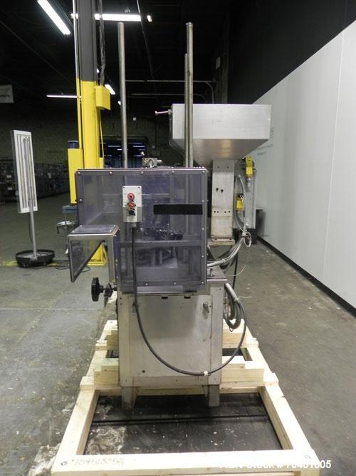 Used Haumiller Stainless Steel (6) Pocket Spray Tip Applicator. Single Hammer, 16” vibratory feeder bowl. Approximate 24” x 24” x 12” deep hopper. Allen Bradley Panel View 1000.