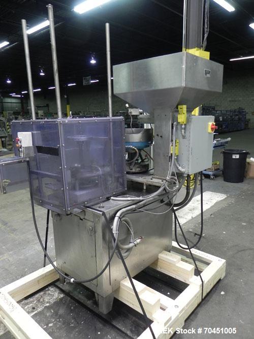 Used Haumiller Stainless Steel (6) Pocket Spray Tip Applicator. Single Hammer, 16” vibratory feeder bowl. Approximate 24” x 24” x 12” deep hopper. Allen Bradley Panel View 1000.