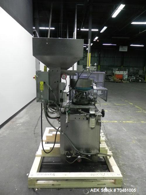 Used Haumiller Stainless Steel (6) Pocket Spray Tip Applicator. Single Hammer, 16” vibratory feeder bowl. Approximate 24” x 24” x 12” deep hopper. Allen Bradley Panel View 1000.