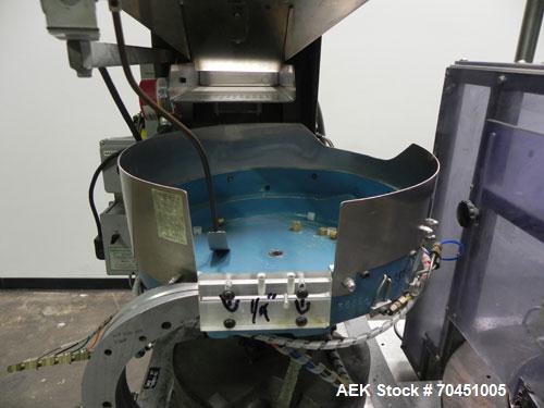 Used Haumiller Stainless Steel (6) Pocket Spray Tip Applicator. Single Hammer, 16” vibratory feeder bowl. Approximate 24” x 24” x 12” deep hopper. Allen Bradley Panel View 1000.