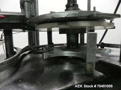 Used Haumiller Stainless Steel (6) Pocket Spray Tip Applicator. Single Hammer, 16” vibratory feeder bowl. Approximate 24” x 24” x 12” deep hopper. Allen Bradley Panel View 1000.