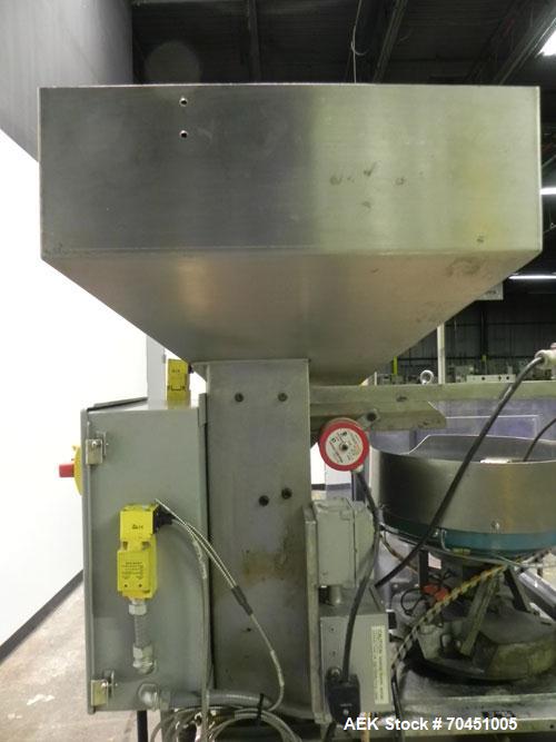 Used Haumiller Stainless Steel (6) Pocket Spray Tip Applicator. Single Hammer, 16” vibratory feeder bowl. Approximate 24” x 24” x 12” deep hopper. Allen Bradley Panel View 1000.