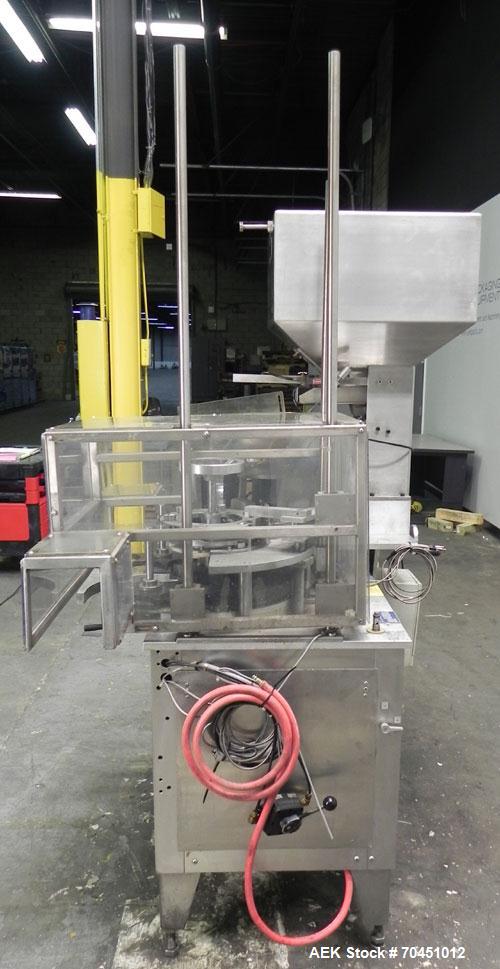 Used Haumiller model 3400 Stainless Steel (6) Pocket Spray Tip Applicator. Single Hammer, 16” vibratory feeder bowl. Approximate 24” x 24” x 12” deep hopper. Allen Bradley Panel View 1000