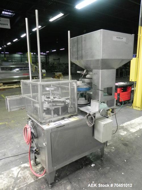 Used Haumiller model 3400 Stainless Steel (6) Pocket Spray Tip Applicator. Single Hammer, 16” vibratory feeder bowl. Approximate 24” x 24” x 12” deep hopper. Allen Bradley Panel View 1000
