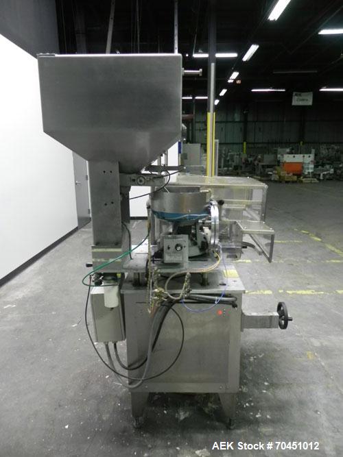 Used Haumiller model 3400 Stainless Steel (6) Pocket Spray Tip Applicator. Single Hammer, 16” vibratory feeder bowl. Approximate 24” x 24” x 12” deep hopper. Allen Bradley Panel View 1000