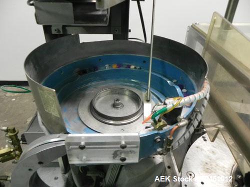 Used Haumiller model 3400 Stainless Steel (6) Pocket Spray Tip Applicator. Single Hammer, 16” vibratory feeder bowl. Approximate 24” x 24” x 12” deep hopper. Allen Bradley Panel View 1000