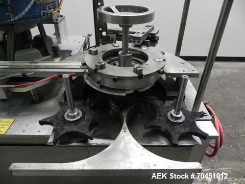 Used Haumiller model 3400 Stainless Steel (6) Pocket Spray Tip Applicator. Single Hammer, 16” vibratory feeder bowl. Approximate 24” x 24” x 12” deep hopper. Allen Bradley Panel View 1000