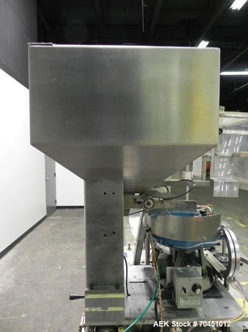 Used Haumiller model 3400 Stainless Steel (6) Pocket Spray Tip Applicator. Single Hammer, 16” vibratory feeder bowl. Approximate 24” x 24” x 12” deep hopper. Allen Bradley Panel View 1000