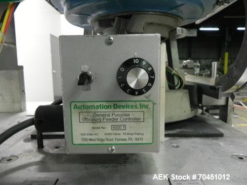 Used Haumiller model 3400 Stainless Steel (6) Pocket Spray Tip Applicator. Single Hammer, 16” vibratory feeder bowl. Approximate 24” x 24” x 12” deep hopper. Allen Bradley Panel View 1000