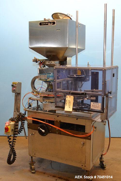 Used Haumiller Model S-Lasta Stainless Steel (6) Pocket Spray Tip Applicator. Single Hammer, 16” vibratory feeder bowl. Approximate 24” x 24” x 12” deep hopper. Allen Bradley Panel View 1000.