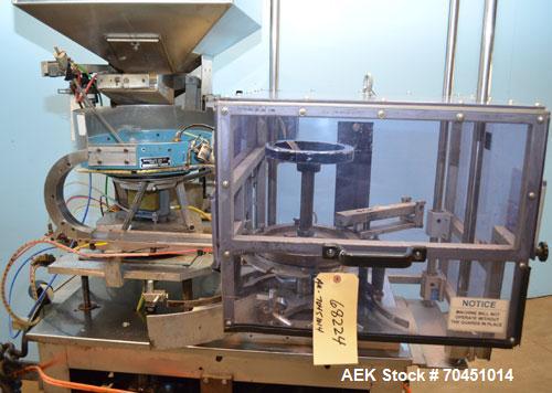 Used Haumiller Model S-Lasta Stainless Steel (6) Pocket Spray Tip Applicator. Single Hammer, 16” vibratory feeder bowl. Approximate 24” x 24” x 12” deep hopper. Allen Bradley Panel View 1000.