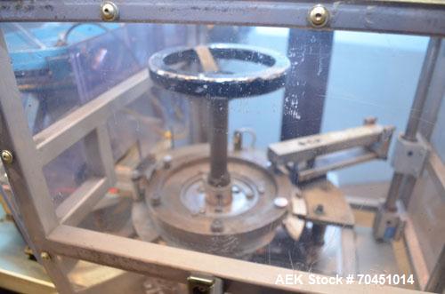 Used Haumiller Model S-Lasta Stainless Steel (6) Pocket Spray Tip Applicator. Single Hammer, 16” vibratory feeder bowl. Approximate 24” x 24” x 12” deep hopper. Allen Bradley Panel View 1000.