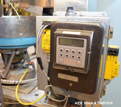 Used Haumiller Model S-Lasta Stainless Steel (6) Pocket Spray Tip Applicator. Single Hammer, 16” vibratory feeder bowl. Approximate 24” x 24” x 12” deep hopper. Allen Bradley Panel View 1000.