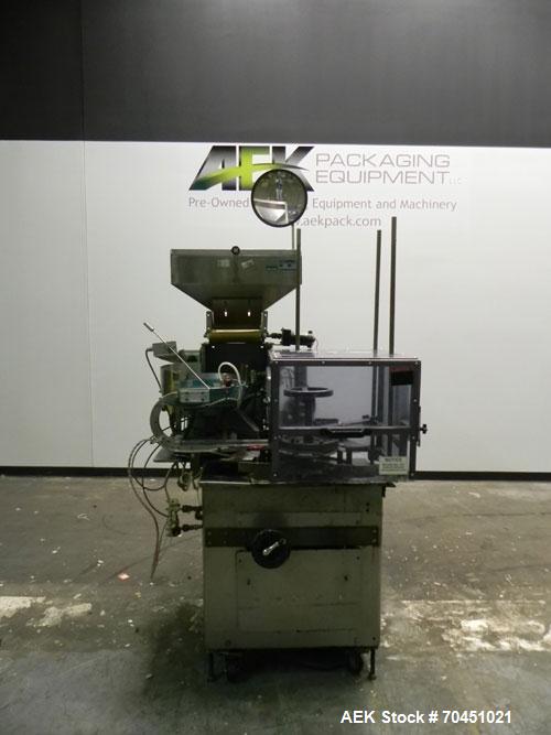 Used Haumiller Model Lasta Stainless Steel 6-Pocket Spray Tip Applicator. Single Hammer, 16” vibratory feeder bowl. Approximate 24” x 24” x 12” deep hopper. Allen Bradley Panel View 1000.