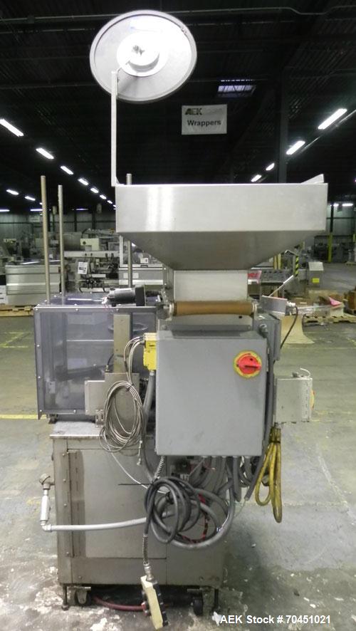 Used Haumiller Model Lasta Stainless Steel 6-Pocket Spray Tip Applicator. Single Hammer, 16” vibratory feeder bowl. Approximate 24” x 24” x 12” deep hopper. Allen Bradley Panel View 1000.